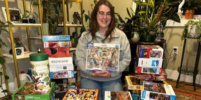 Abby with puzzle collection